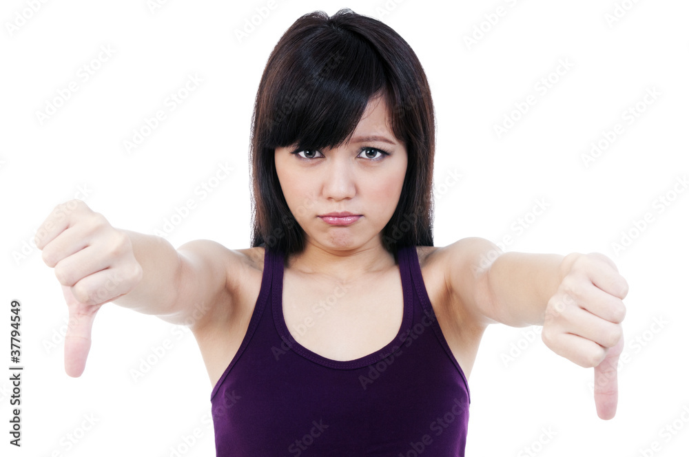 Young Asian Woman Showing Thumb Down Sign Young Asian Woman Showing Thumb Down Sign