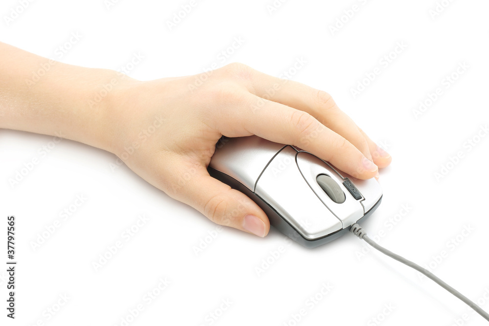 Woman hand with computer mouse on a white background Woman hand with computer mouse on a white background