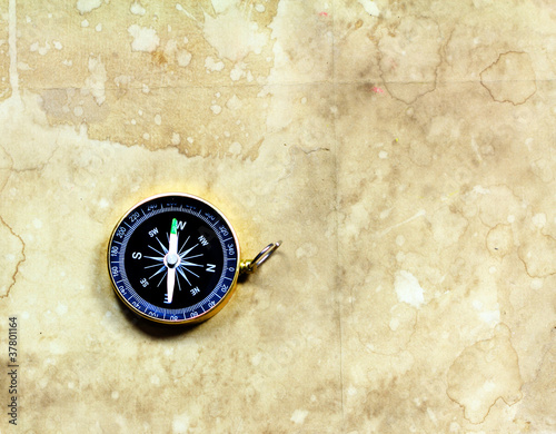 Compass with old gunge paper background