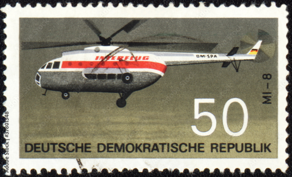 Flying helicopter Mi-8 on post stamp