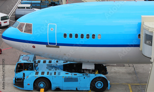 plane pushed back at gate