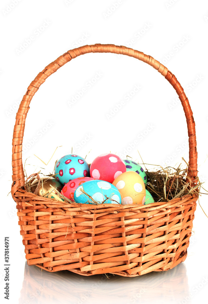 Colorful Easter eggs in the basket  isolated on white