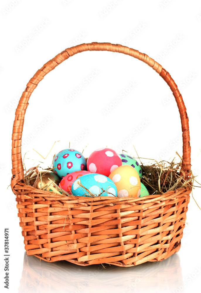 Colorful Easter eggs in the basket isolated on white Colorful Easter eggs in the basket isolated on white