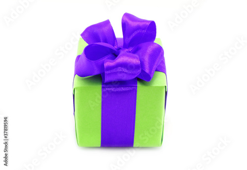 Present box with purple bow on a white background