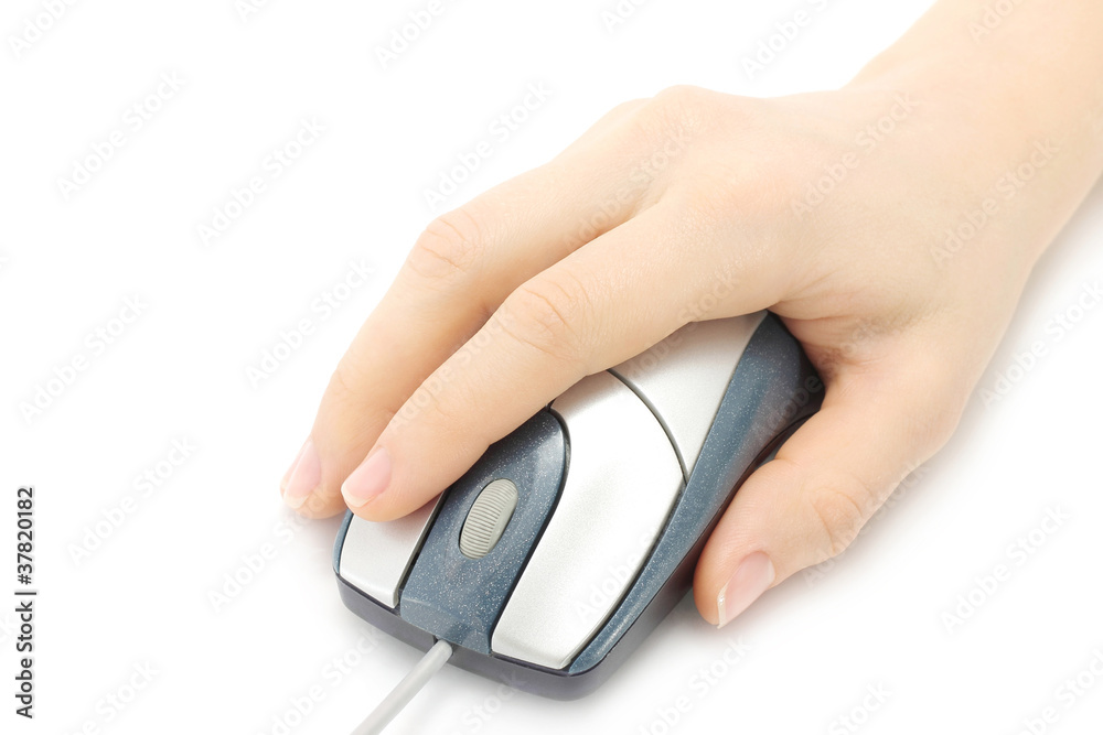 Woman hand with computer mouse on a white background Woman hand with computer mouse on a white background