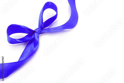 Big blue holiday bow on white background