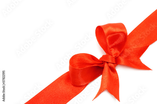 Big red holiday bow on white background