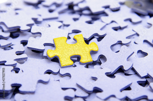 Blue puzzle with one yellow element