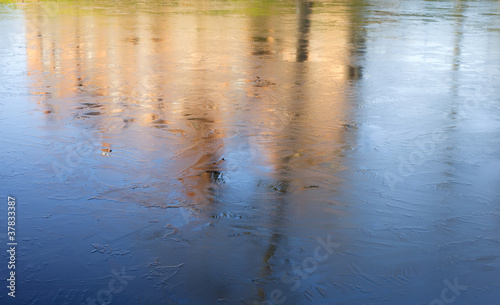 Reflections in frozen water.