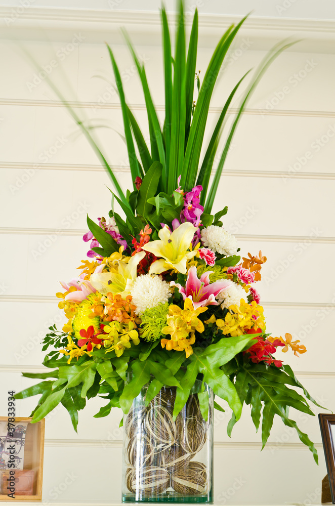 Fototapeta premium Bouguet with variety flower in glass