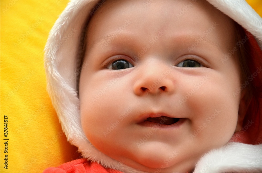 baby in Christmas bonnet baby in Christmas bonnet