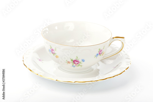 beautiful vintage cup and saucer on white background