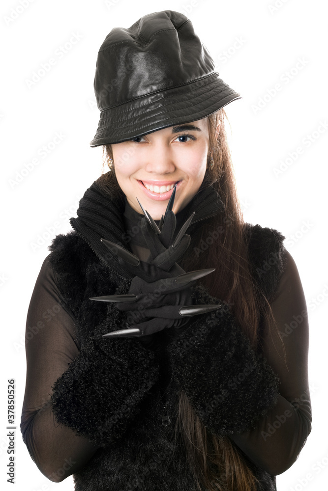 Portrait of smiling young brunette in gloves with claws Portrait of smiling young brunette in gloves with claws