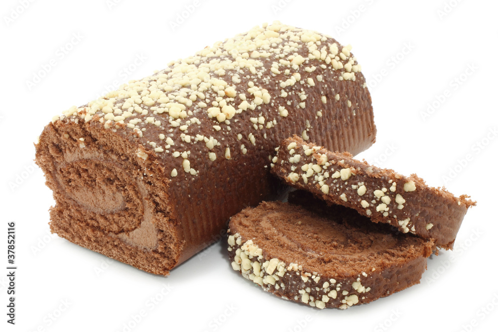 Chocolate Swiss roll closeup on a white background Chocolate Swiss roll closeup on a white background