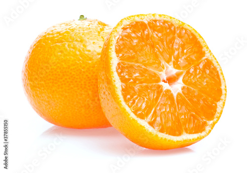 One ripe juicy tangerine and half isolated on white background