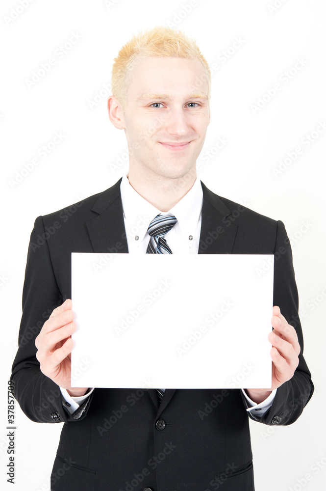young businessman holding a blank whiteboard young businessman holding a blank whiteboard
