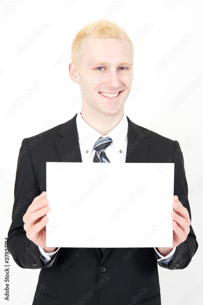 young businessman holding a blank whiteboard young businessman holding a blank whiteboard