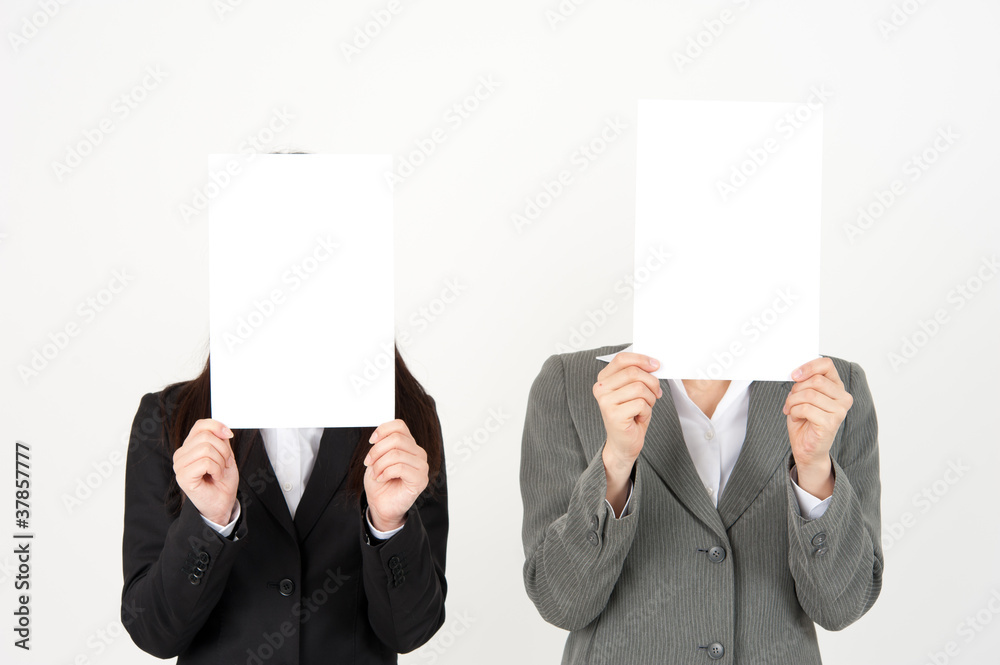 business team holding a blank whiteboard business team holding a blank whiteboard