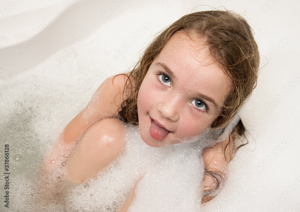 Little girl in soap foam Little girl in soap foam