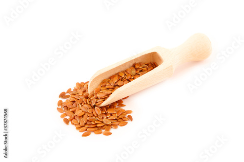 Linseed on wooden spoon photo