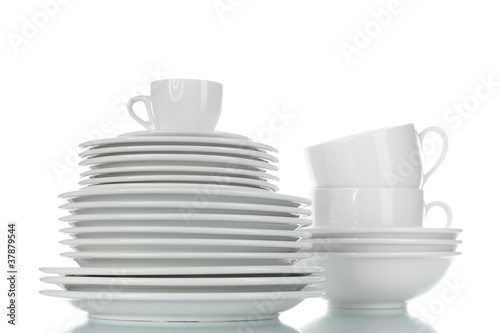 empty bowls, plates and cups isolated on white