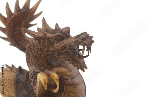 Wooden dragon, symbol of chinese new year, isolated on white