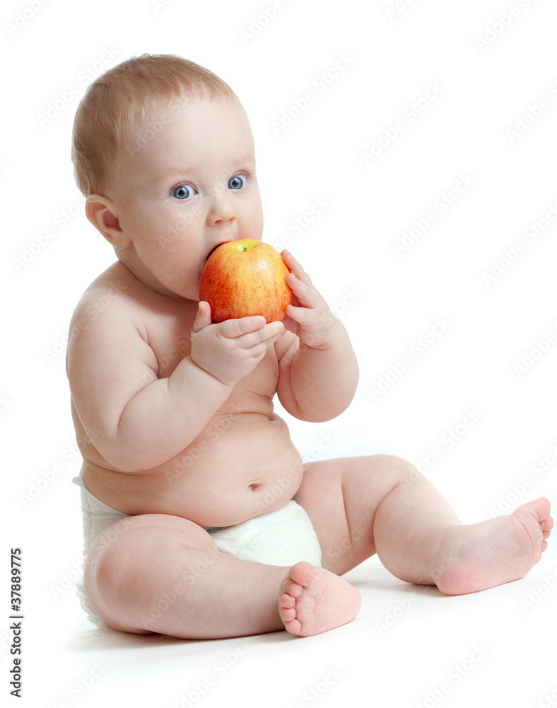 Baby boy eating healthy food isolated Baby boy eating healthy food isolated