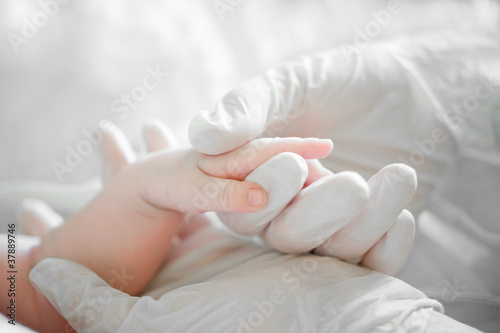 A helping hand to little baby in hospital