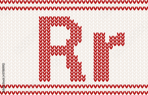Red knitted Letter r on beige Background