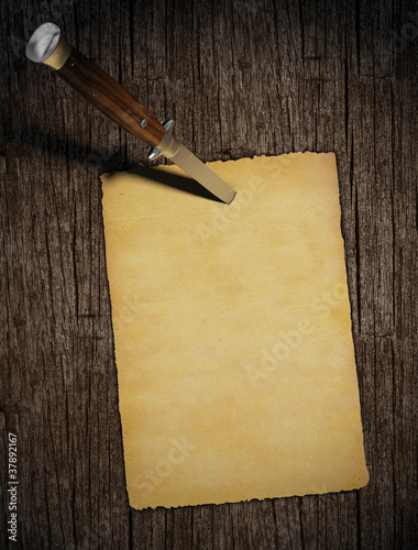 copy space on paper nailed with pocket knife