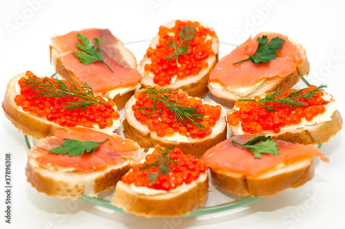 red caviar and smoked salmon on bread