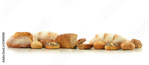 Composition with bread and rolls isolated on white photo