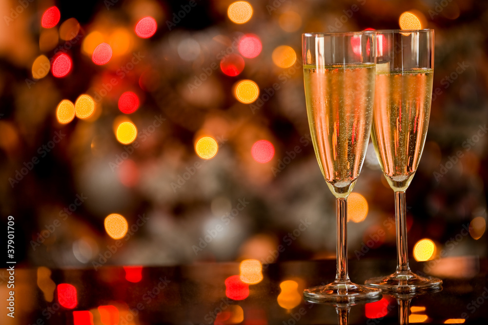 Champagner on Glass Table with Bokeh background Champagner on Glass Table with Bokeh background