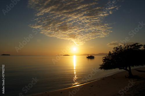 Sunset on the beach of Seraya island - Flores, Indonesia - Asia photo