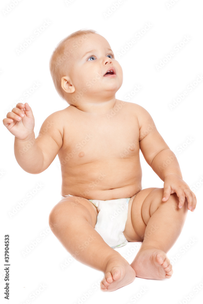 Smiling baby sitting on the floor Smiling baby sitting on the floor