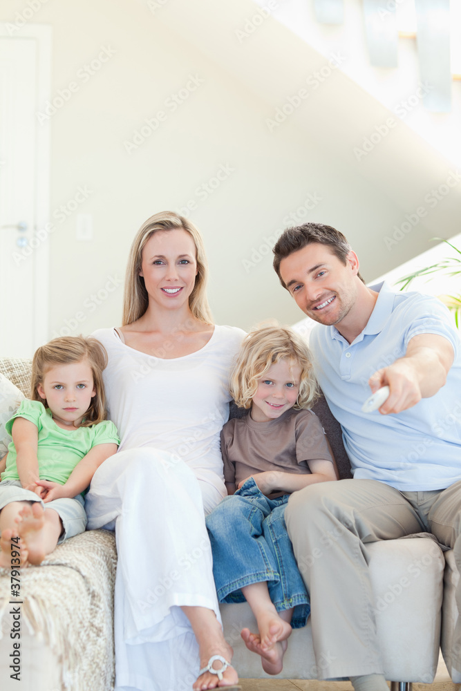 Family enjoying a movie