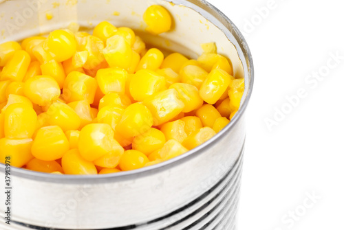 opening can with corn isolated on the white