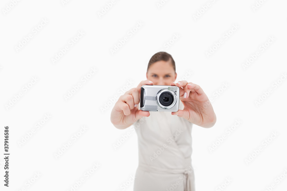 Young businesswoman taking a picture Young businesswoman taking a picture