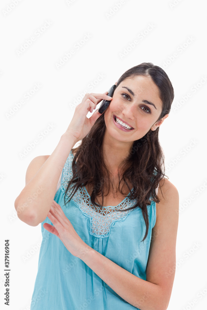 Portrait of a woman making a phone call Portrait of a woman making a phone call