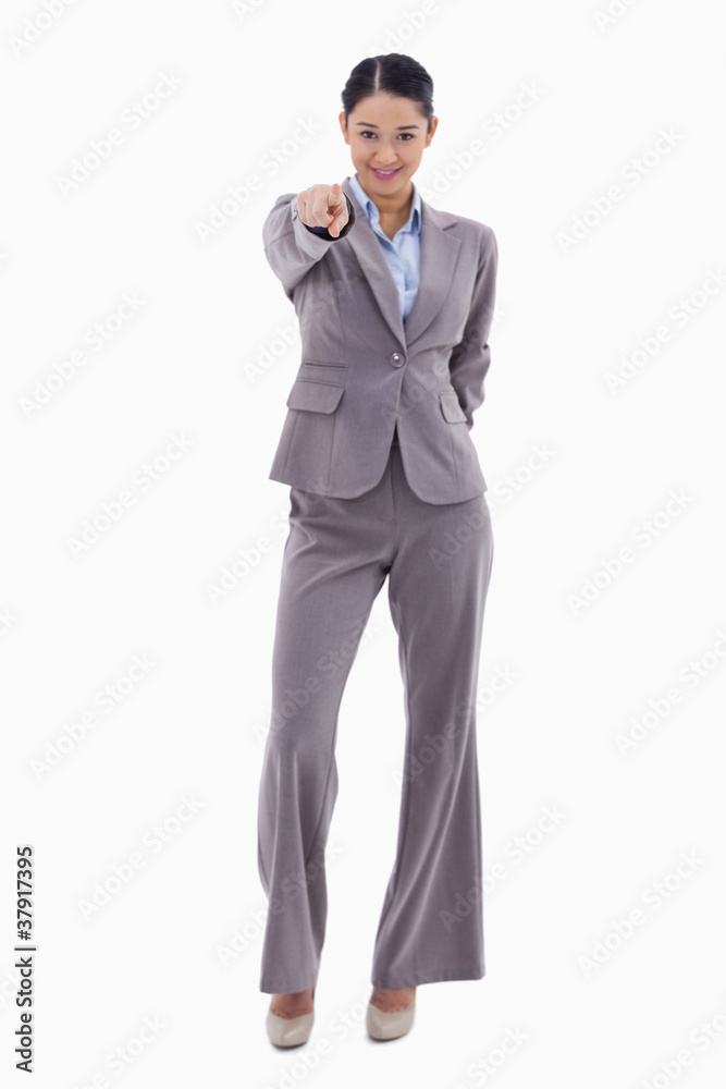 Portrait of a happy businesswoman pointing at the viewer Portrait of a happy businesswoman pointing at the viewer