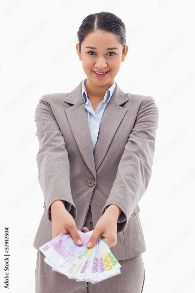 Portrait of a businesswoman showing bank notes Portrait of a businesswoman showing bank notes