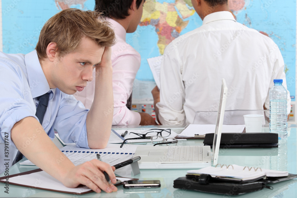 Fototapeta premium Exasperated man working at a laptop