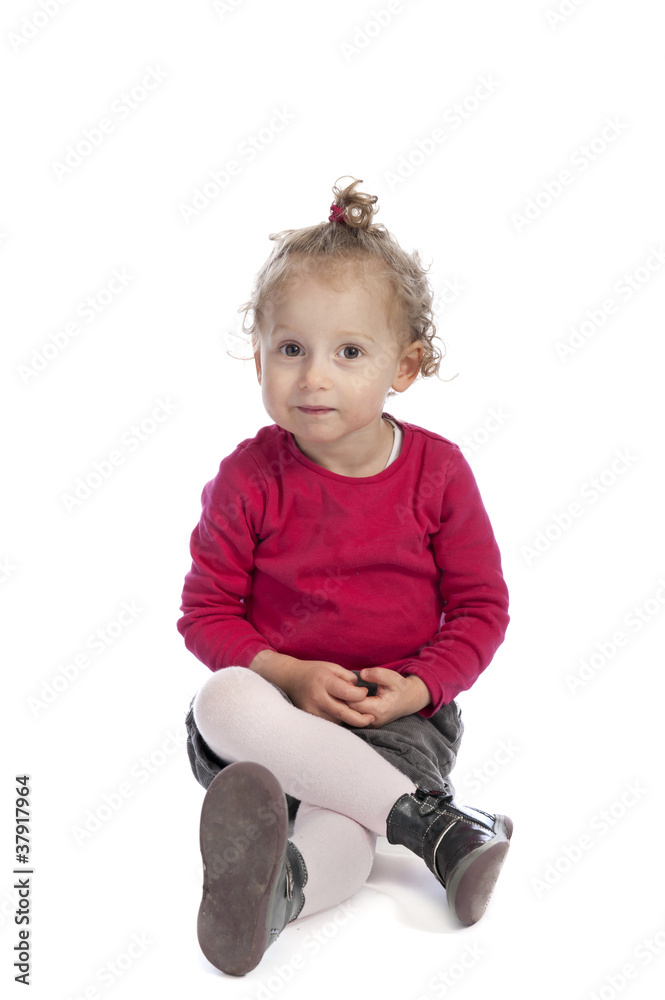 cute little girl seated on the floor cute little girl seated on the floor