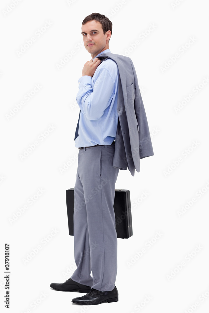 Side view of businessman with suitcase