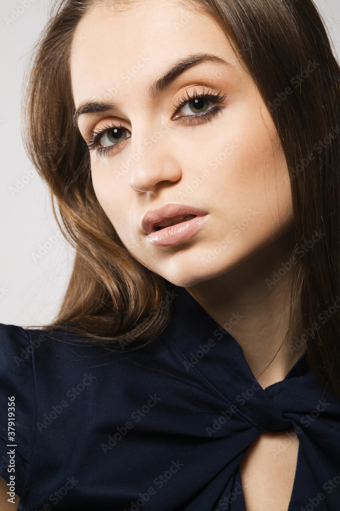 Beautiful fashion model in strict blue dress Beautiful fashion model in strict blue dress