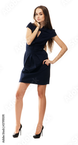 Beautiful fashion model in strict blue dress