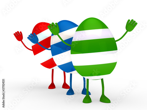 Drei bunte Ostereier winken