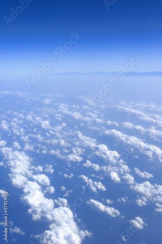 blue sky clouds view from aircraft airplane sunny day