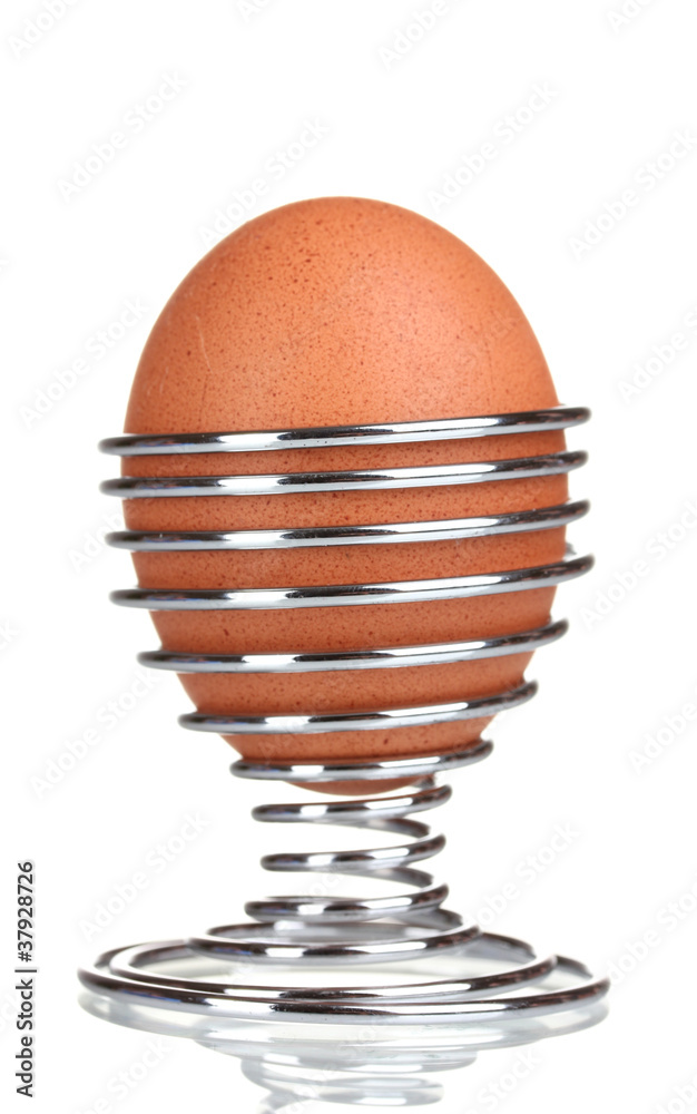 boiled egg in metal stand isolated on white boiled egg in metal stand isolated on white