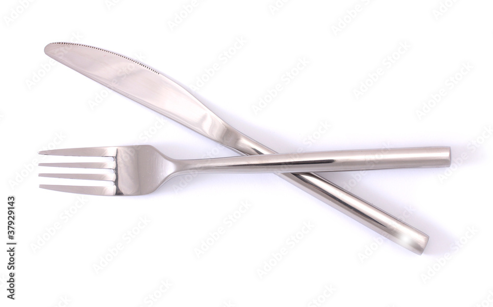 Silver fork and knife isolated on white Silver fork and knife isolated on white